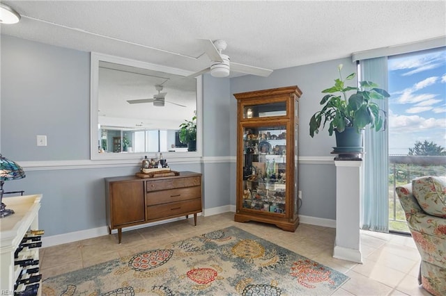 1222 E Ocean View Ave Unit 302, Norfolk, VA 23503 - dining space featuring a ceiling fan, tile patterned floors, and a textured ceiling