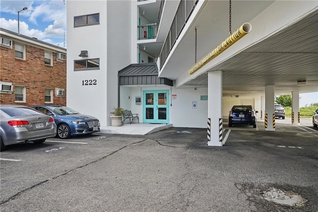 1222 E Ocean View Ave Unit 302, Norfolk, VA 23503 - parking lot with french doors