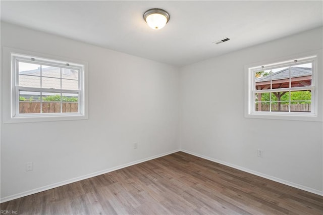 669 Kenneth Rd, Virginia Beach, VA 23462 - spare room with wood finished floors and baseboards