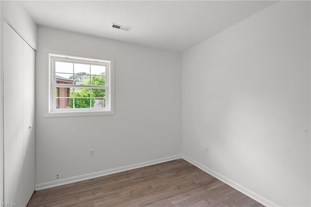 669 Kenneth Rd, Virginia Beach, VA 23462 - unfurnished room with wood finished floors and baseboards