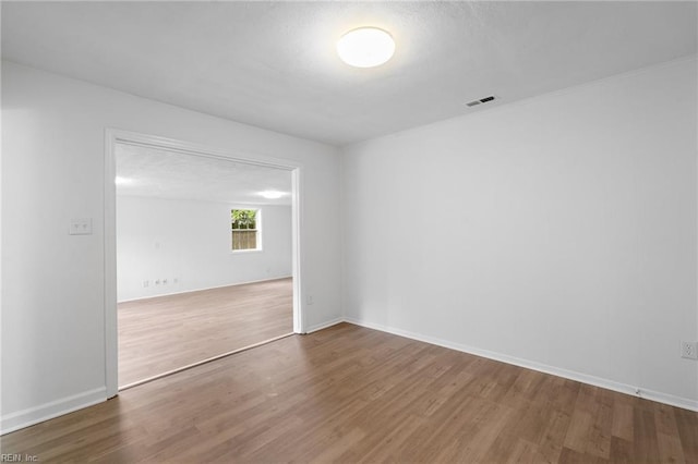 669 Kenneth Rd, Virginia Beach, VA 23462 - spare room featuring wood finished floors and baseboards