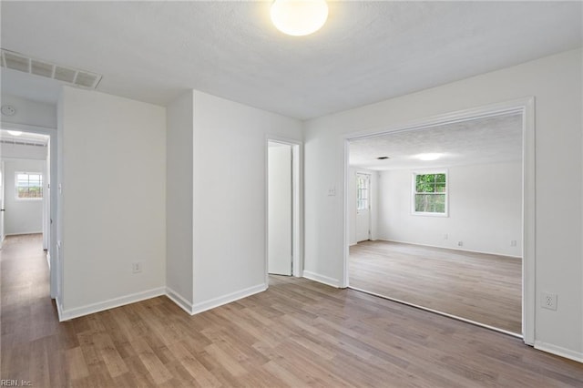 669 Kenneth Rd, Virginia Beach, VA 23462 - unfurnished room with wood finished floors and baseboards
