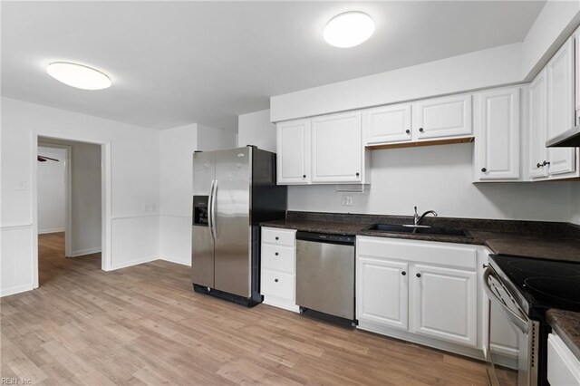 669 Kenneth Rd, Virginia Beach, VA 23462 - kitchen with stainless steel appliances, a sink, and white cabinets