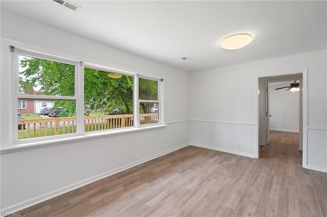 669 Kenneth Rd, Virginia Beach, VA 23462 - empty room with wood finished floors and baseboards