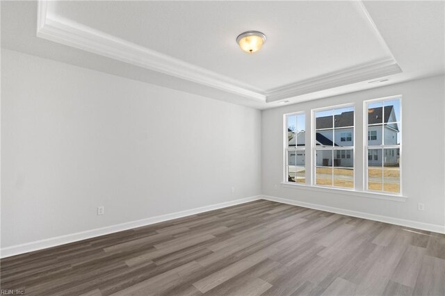 2237 Sanibel Ln, Chesapeake, VA 23321 - spare room with a raised ceiling, wood finished floors, baseboards, and ornamental molding
