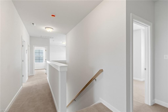2237 Sanibel Ln, Chesapeake, VA 23321 - corridor with an upstairs landing, light colored carpet, and baseboards