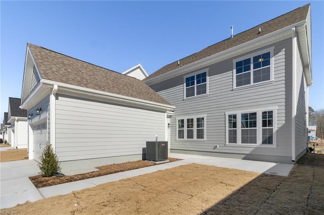 2237 Sanibel Ln, Chesapeake, VA 23321 - back of house with central air condition unit and driveway