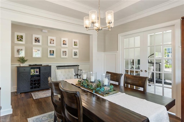 2316 William D Lee Ct, Virginia Beach, VA 23456 - dining room with a chandelier, dark wood-style floors, a decorative wall, a wainscoted wall, and crown molding