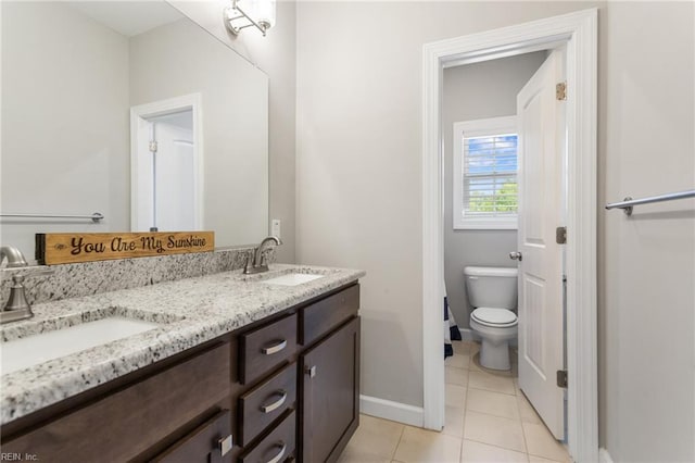 2316 William D Lee Ct, Virginia Beach, VA 23456 - full bath featuring tile patterned flooring, baseboards, toilet, and double vanity