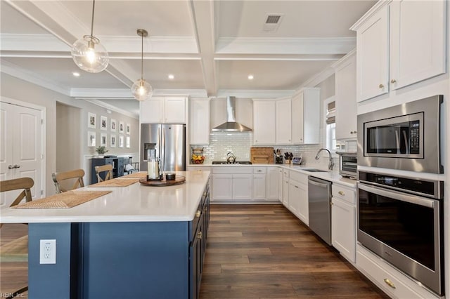 2316 William D Lee Ct, Virginia Beach, VA 23456 - kitchen with appliances with stainless steel finishes, wall chimney exhaust hood, a sink, white cabinets, and beamed ceiling