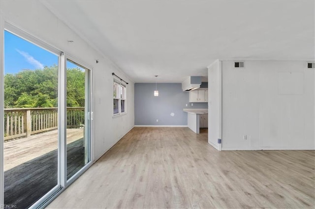 4404 Ocean View Ave, Virginia Beach, VA 23455 - unfurnished living room with light wood finished floors and baseboards