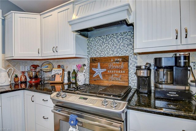 9527 24th Bay St, Norfolk, VA 23518 - kitchen with stainless steel range with gas stovetop, premium range hood, white cabinetry, backsplash, and dark stone countertops