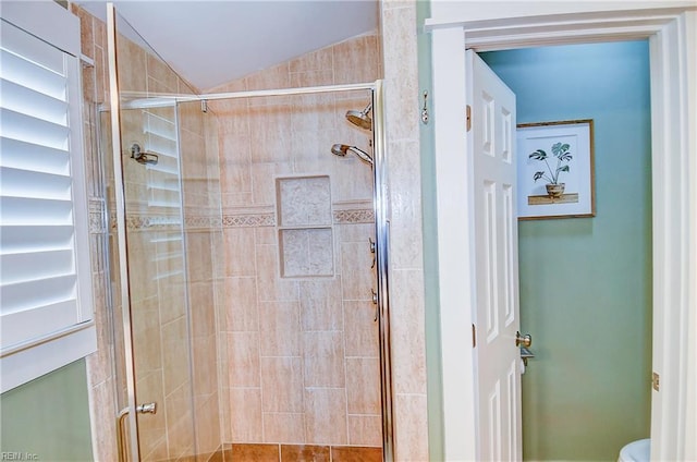 9527 24th Bay St, Norfolk, VA 23518 - bathroom with a stall shower, vaulted ceiling, and toilet