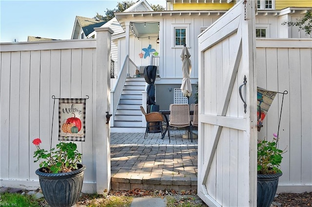 9527 24th Bay St, Norfolk, VA 23518 - view of patio / terrace featuring fence and stairway