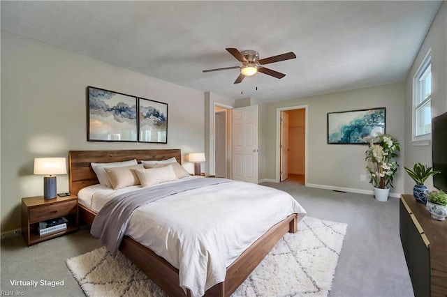913 Fluvanna Rd, Newport News, VA 23601 - bedroom featuring light colored carpet, baseboards, a walk in closet, and ceiling fan