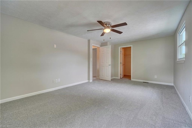 913 Fluvanna Rd, Newport News, VA 23601 - carpeted empty room featuring ceiling fan, a textured ceiling, and baseboards