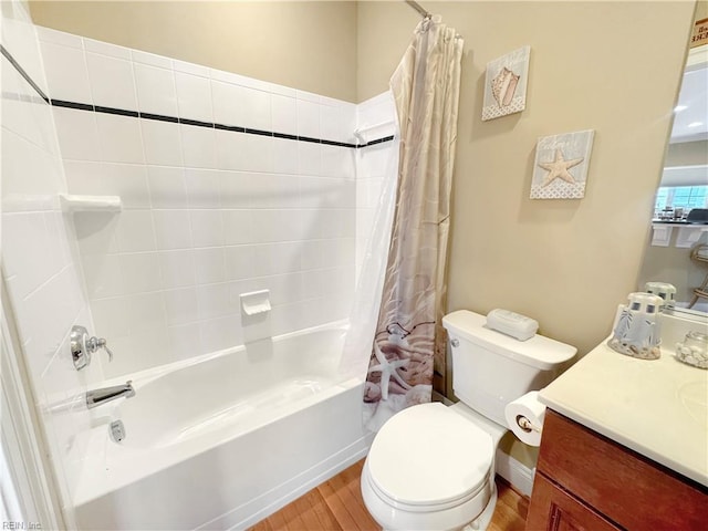 564 Riverside Dr, Lancaster, VA 22503 - full bath featuring wood finished floors, shower / bath combo, toilet, and vanity