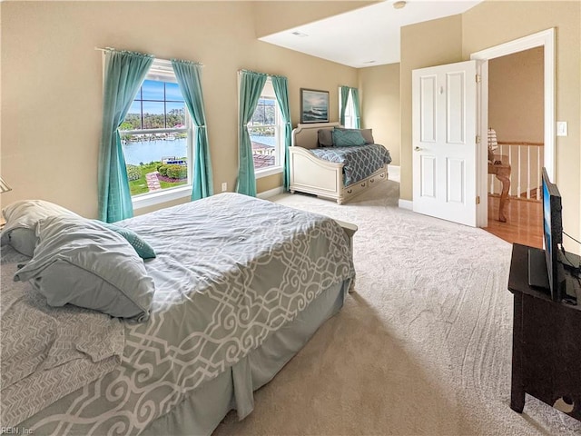 564 Riverside Dr, Lancaster, VA 22503 - bedroom featuring a water view and carpet floors