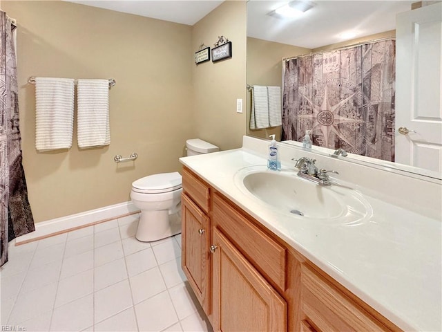 564 Riverside Dr, Lancaster, VA 22503 - bathroom with toilet, tile patterned flooring, vanity, and baseboards