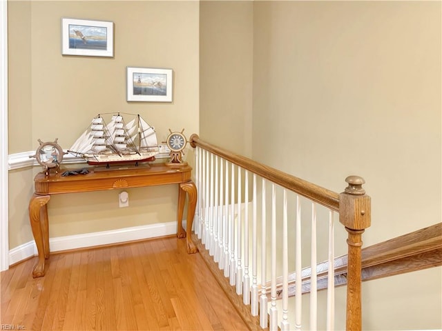 564 Riverside Dr, Lancaster, VA 22503 - stairway with wood finished floors and baseboards