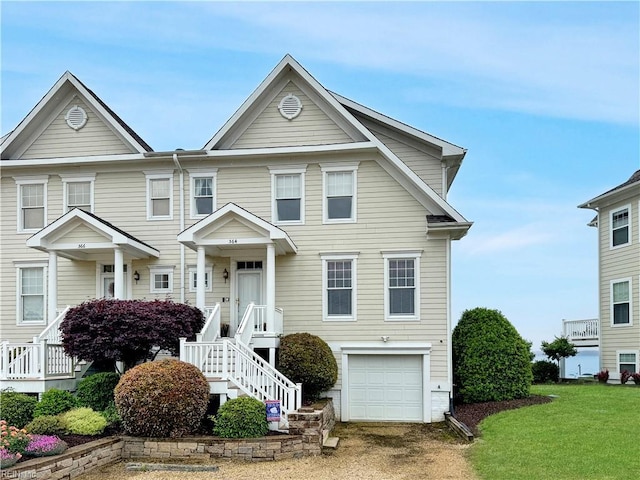 564 Riverside Dr, Lancaster, VA 22503 - view of front of house with an attached garage and driveway