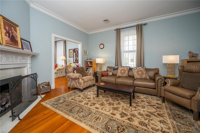 502 Pembroke Ave, Norfolk, VA 23507 - living area featuring crown molding, wood finished floors, a fireplace, and baseboards