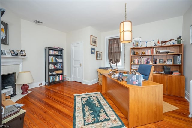 502 Pembroke Ave, Norfolk, VA 23507 - office space featuring a brick fireplace, wood finished floors, and baseboards