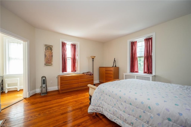 502 Pembroke Ave, Norfolk, VA 23507 - bedroom featuring wood-type flooring, radiator, and baseboards