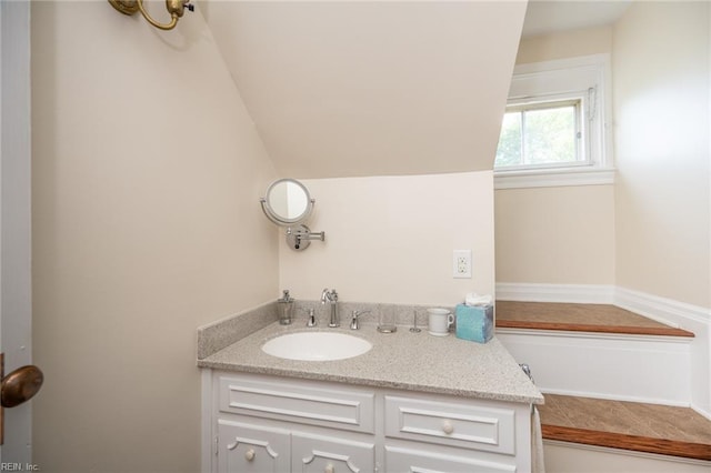 502 Pembroke Ave, Norfolk, VA 23507 - bathroom featuring vanity and lofted ceiling