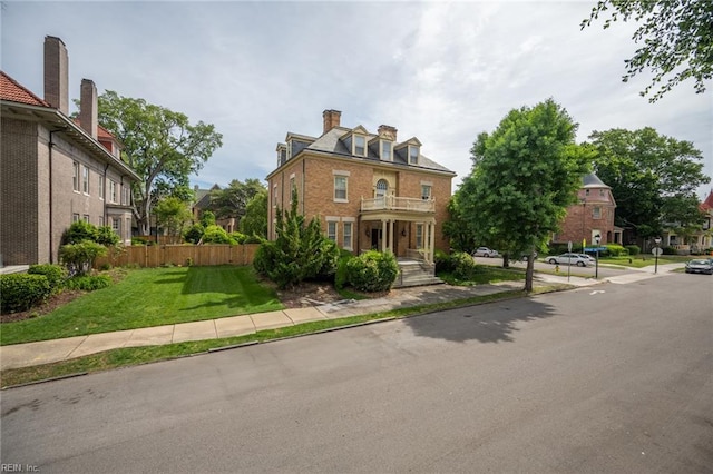 502 Pembroke Ave, Norfolk, VA 23507 - view of front of house with a balcony, a chimney, and brick siding