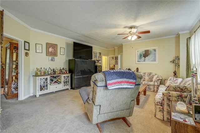 10402 Freewelcome Ln, Gloucester, VA 23061 - carpeted living room with ornamental molding, a ceiling fan, a textured ceiling, and baseboards