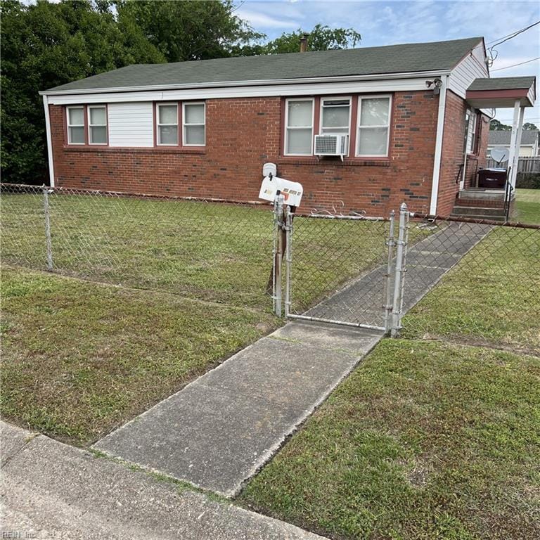 305 Keith Ct, Chesapeake, VA 23325 - view of front of home with brick siding, a gate, cooling unit, and roof with shingles