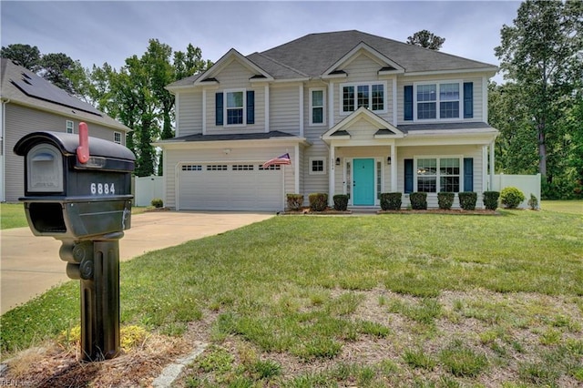 6884 Emerson Ln, Hayes, VA 23072 - view of front of house with a garage and driveway
