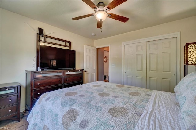 6884 Emerson Ln, Hayes, VA 23072 - bedroom featuring wood finished floors, a closet, and a ceiling fan