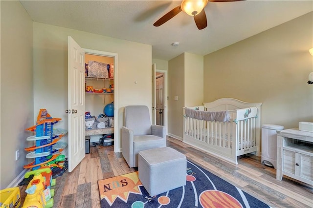 6884 Emerson Ln, Hayes, VA 23072 - bedroom featuring wood finished floors, a ceiling fan, baseboards, and a closet