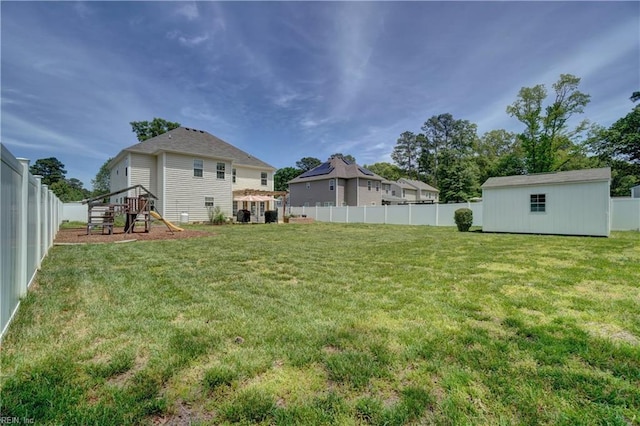 6884 Emerson Ln, Hayes, VA 23072 - view of yard with a playground and an outdoor structure