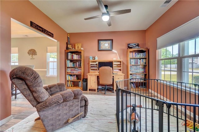 6884 Emerson Ln, Hayes, VA 23072 - home office with ceiling fan, healthy amount of natural light, and light wood-type flooring