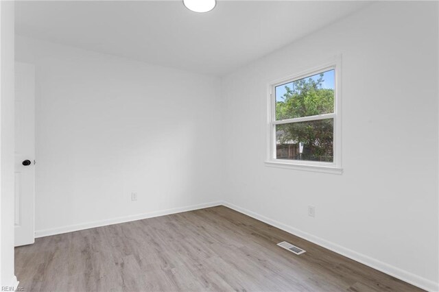 1304 Woodcrest Dr, Hampton, VA 23663 - unfurnished room with wood finished floors and baseboards