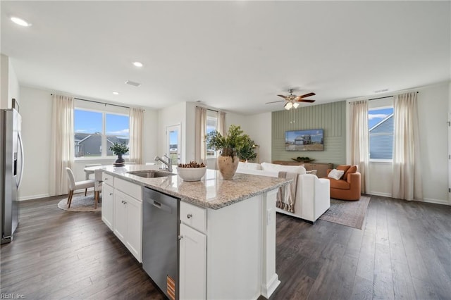 303 Mizzen Way, Elizabeth City, NC 27909 - kitchen featuring stainless steel appliances, a sink, dark wood-style flooring, a kitchen island with sink, and ceiling fan