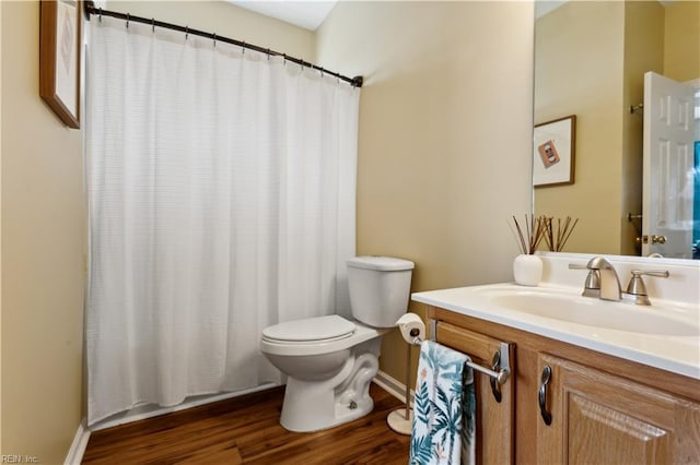 825 Wyemouth Dr, Newport News, VA 23602 - full bath with toilet, wood finished floors, vanity, baseboards, and curtained shower