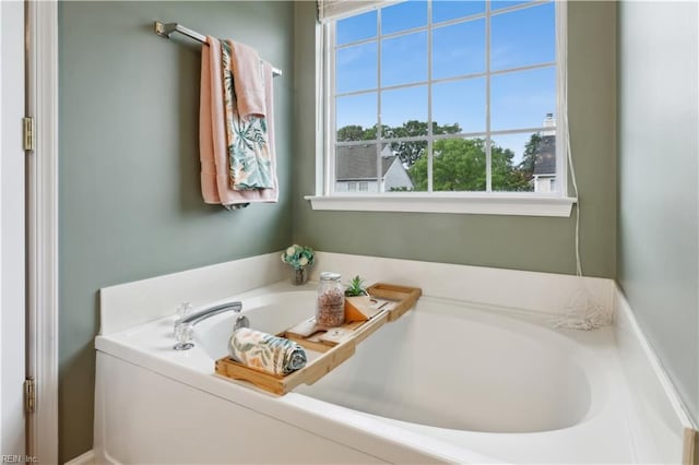 825 Wyemouth Dr, Newport News, VA 23602 - full bath with healthy amount of natural light and a garden tub