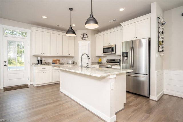 1951 Flintshire Dr, Chesapeake, VA 23323 - kitchen featuring stainless steel appliances, a sink, white cabinetry, and recessed lighting