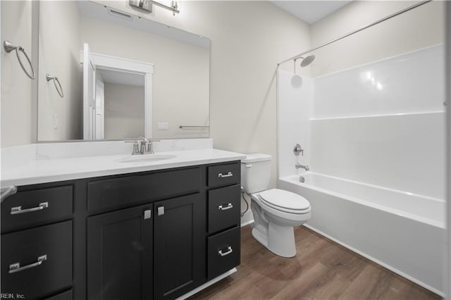 2094 Asher Dr, Suffolk, VA 23435 - full bath with wood finished floors, toilet, vanity, and shower / bathtub combination