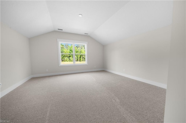 2094 Asher Dr, Suffolk, VA 23435 - additional living space with lofted ceiling, carpet flooring, and baseboards