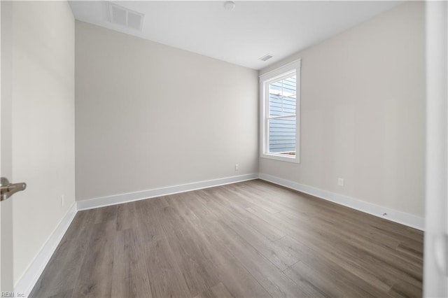 2094 Asher Dr, Suffolk, VA 23435 - empty room with wood finished floors and baseboards