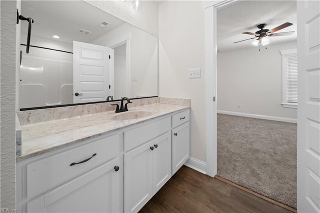 5376 Kenmere Ln, Smithfield, VA 23430 - full bathroom with ceiling fan, vanity, baseboards, wood finished floors, and recessed lighting