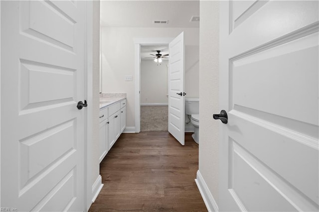 5376 Kenmere Ln, Smithfield, VA 23430 - bathroom featuring a ceiling fan, toilet, wood finished floors, vanity, and baseboards