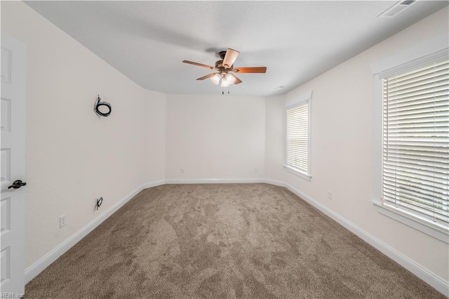 5376 Kenmere Ln, Smithfield, VA 23430 - empty room with ceiling fan, carpet flooring, plenty of natural light, and baseboards