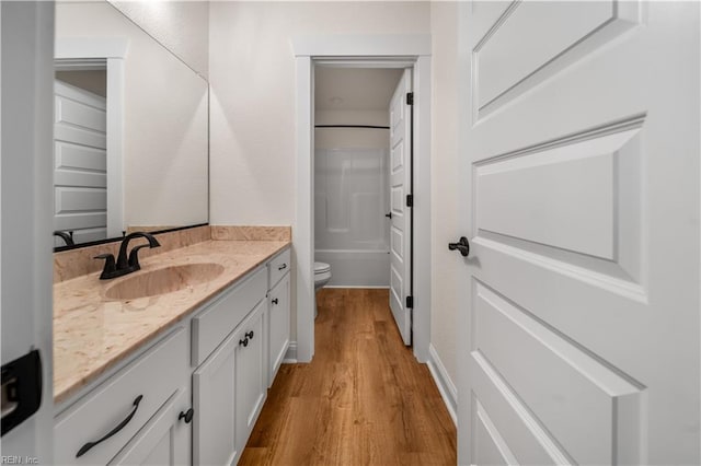 5376 Kenmere Ln, Smithfield, VA 23430 - bathroom with vanity, wood finished floors, and toilet