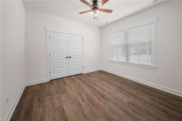 5376 Kenmere Ln, Smithfield, VA 23430 - unfurnished bedroom featuring wood finished floors, baseboards, and a closet